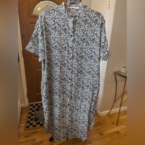 Woman’s Black and White Patterned Dress